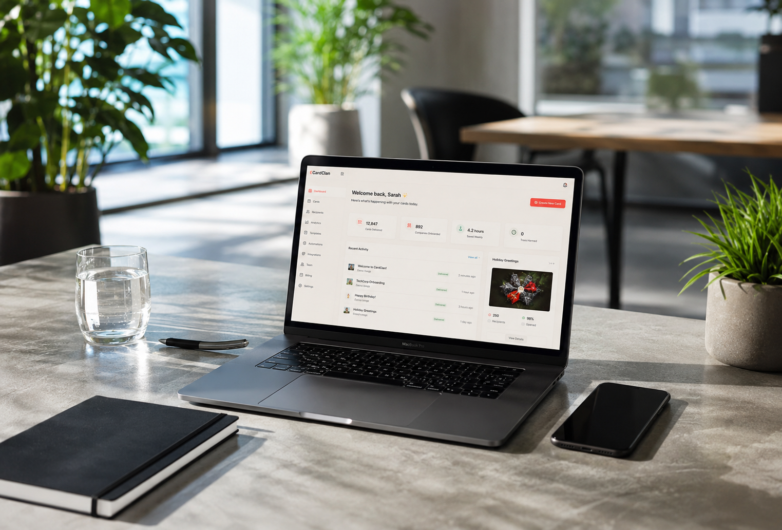 CardClan dashboard running on MacBook Pro in a modern office
